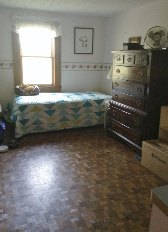 69 East Main Street Rindge, NH 03461 - Photo 20 of 27 a bedroom with a bed and a window