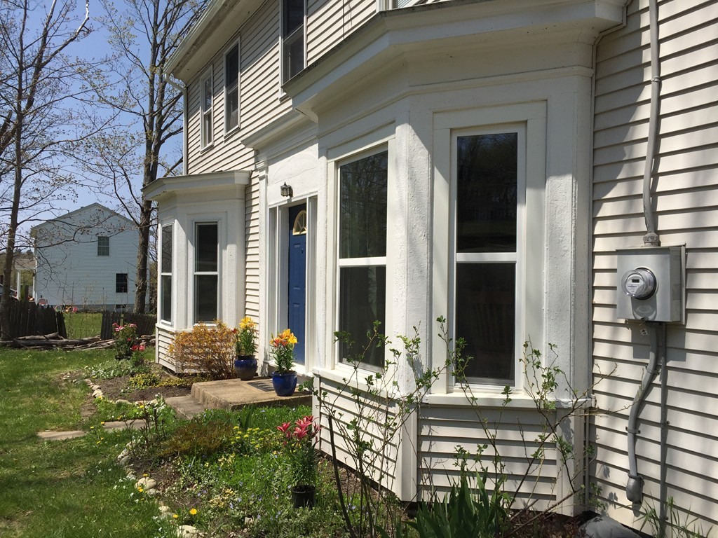 69 East Main Street Rindge, NH 03461 - Photo 22 of 27 front view of a house with a yard