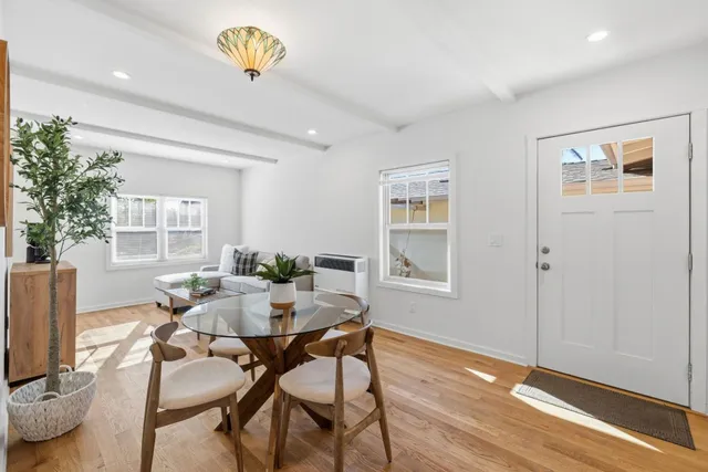 a spacious bedroom with a bed and a couch