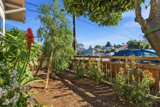 a view of a balcony with an outdoor space
