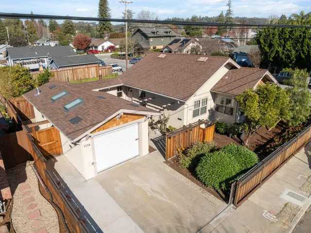 a view of a house with a street