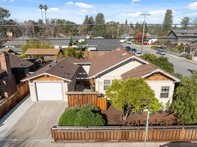 a view of a city street with cars