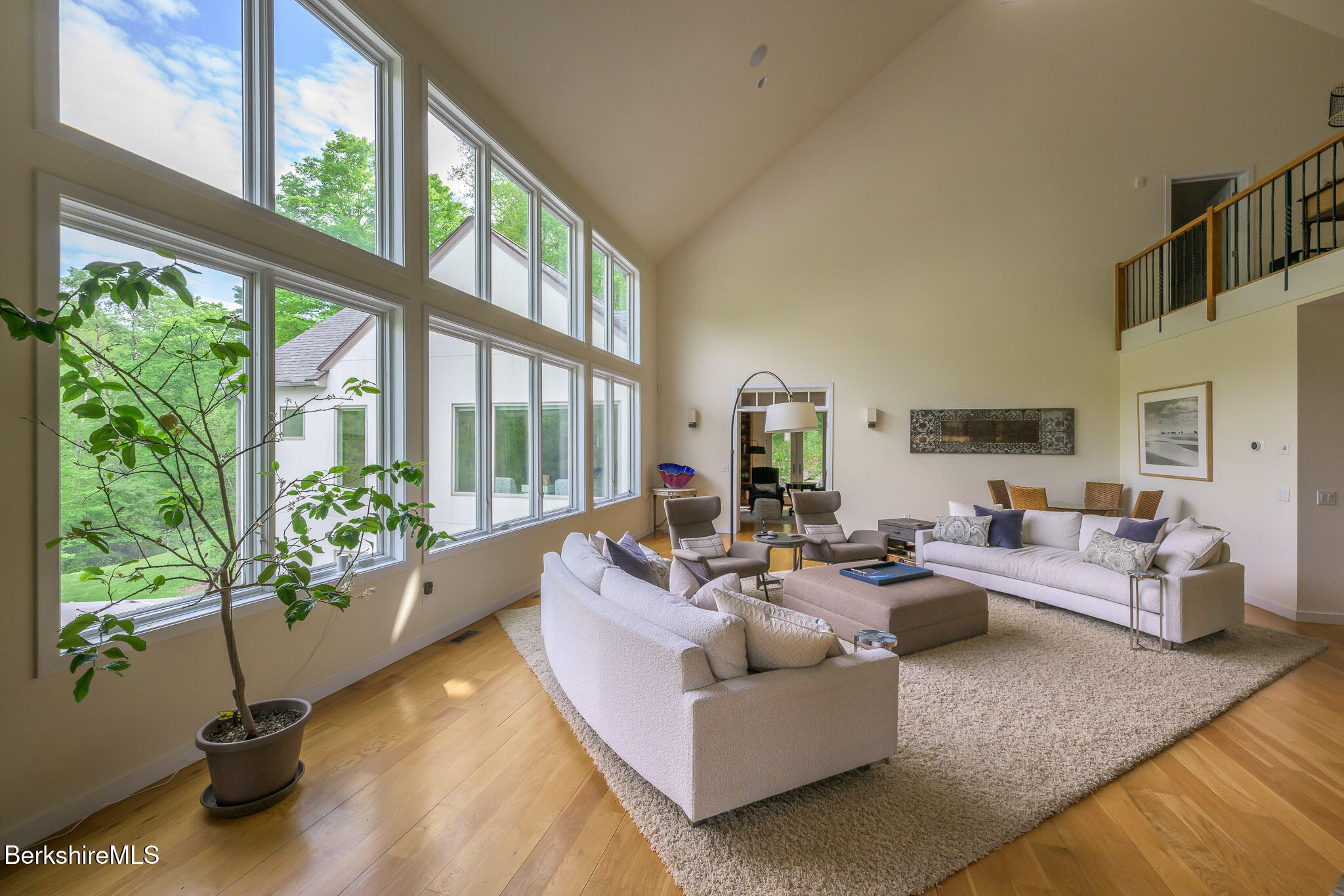 83 Maple Hill Road West Stockbridge, MA 01266 - Photo 15 of 78 a living room with furniture and a large window