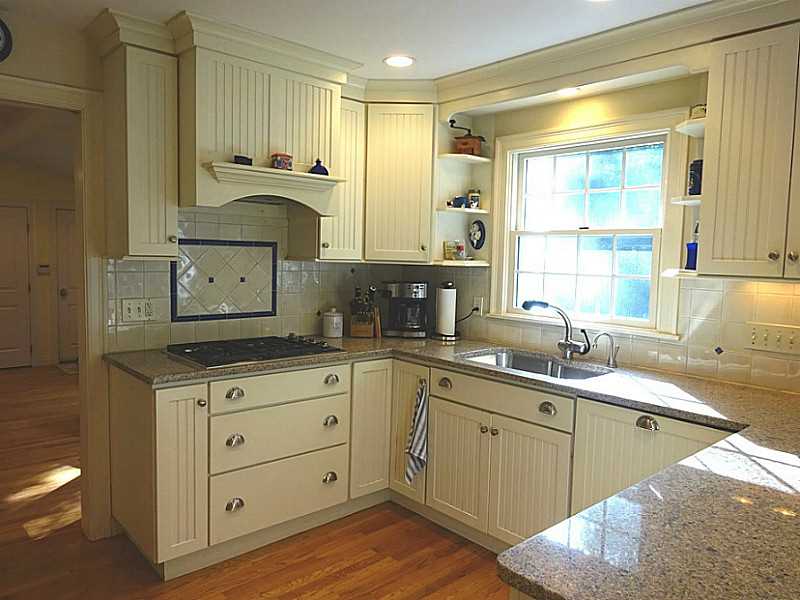 48 Pleasant Street Portsmouth, RI 02871 - Photo 13 of 25 Kitchen. A closer view of the granite and the cooking area. Idea set up for the cook.