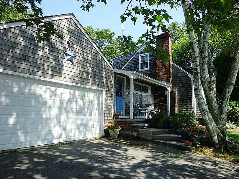 48 Pleasant Street Portsmouth, RI 02871 - Photo 2 of 25 Exterior Front. There is room for storage as well as two cars in the garage. There is parking for 4.Pleasant St is the farthest st in the neighborhood so there is not much through traffic.