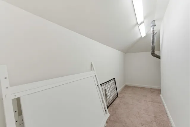 an aerial view of residential house with outdoor space and swimming pool