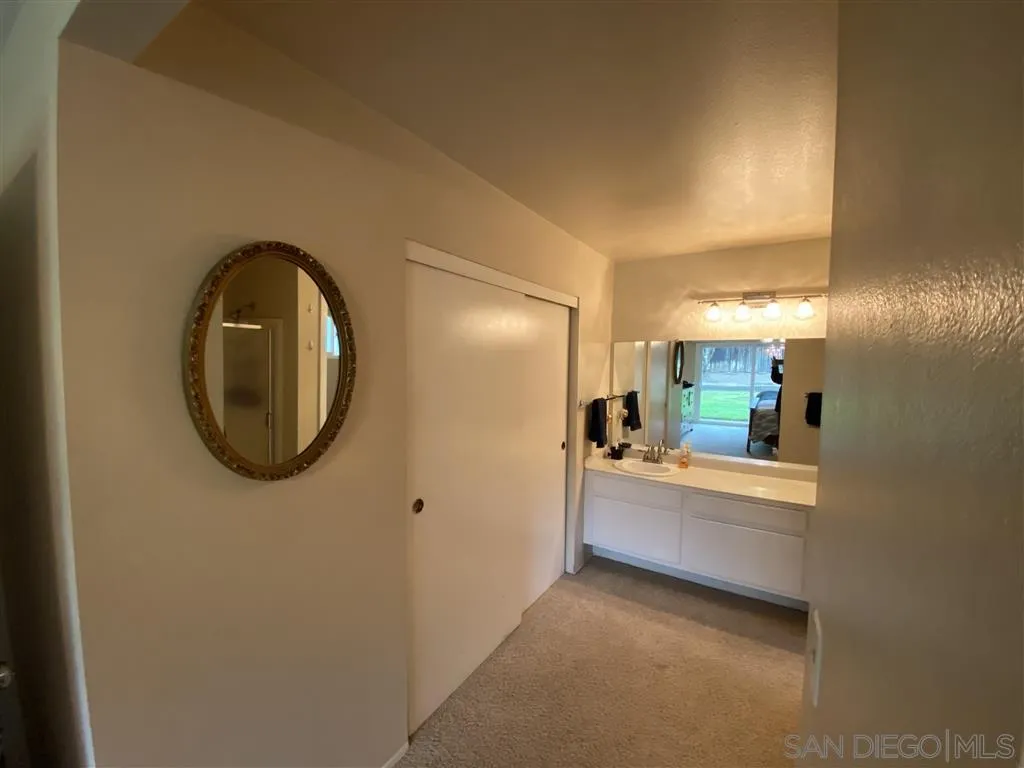 911 La Buena Vida Fallbrook, CA 92028 - Photo 13 of 24 a view of a living room and bathroom