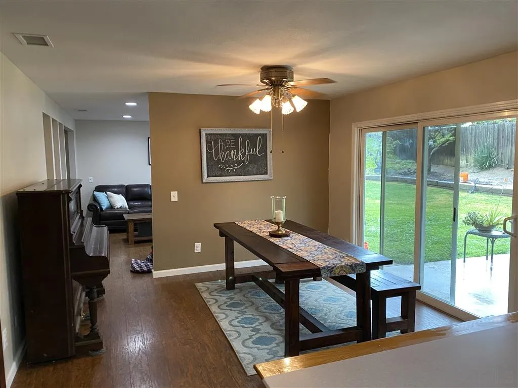 911 La Buena Vida Fallbrook, CA 92028 - Photo 8 of 24 a view of a workspace with furniture and a window