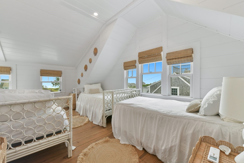 8 Port Pines Road Harwich Port, MA 02646 - Photo 23 of 42 a bedroom with a bed and a large window