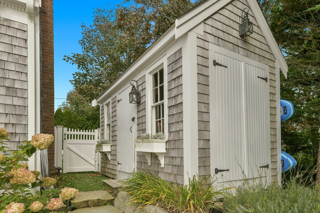 8 Port Pines Road Harwich Port, MA 02646 - Photo 38 of 42 a view of a house with a yard