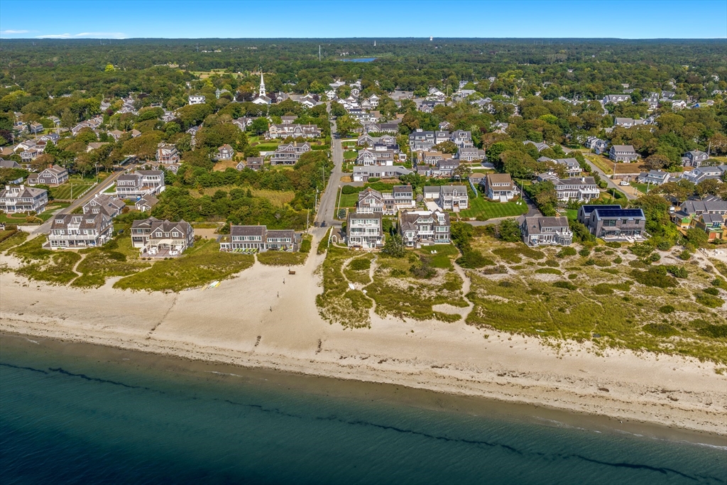 8 Port Pines Road Harwich Port, MA 02646 - Photo 4 of 42 an aerial view of residential houses with outdoor space