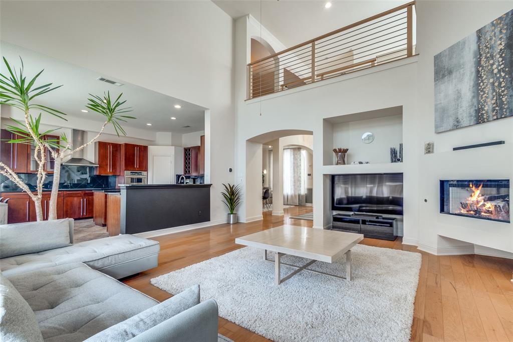 3313 Madison Avenue Hurst, TX 76054 - Photo 12 of 36 Living room with light wood flooring and a high ceiling