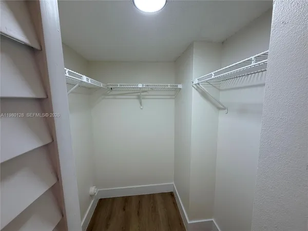 a view of an empty walk in closet
