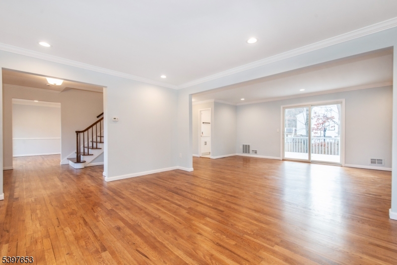 267 Washington Valley Road Randolph, NJ 07869 - Photo 11 of 42 a view of an empty room with wooden floor and a window