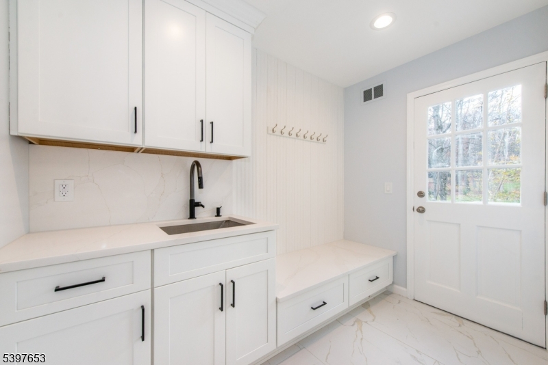 267 Washington Valley Road Randolph, NJ 07869 - Photo 23 of 42 a kitchen with a sink and cabinets