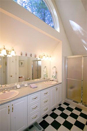 14 Deer Path, Unit 14 Hudson, MA 01749 - Photo 12 of 18 a spacious bathroom with a double vanity sink and mirror