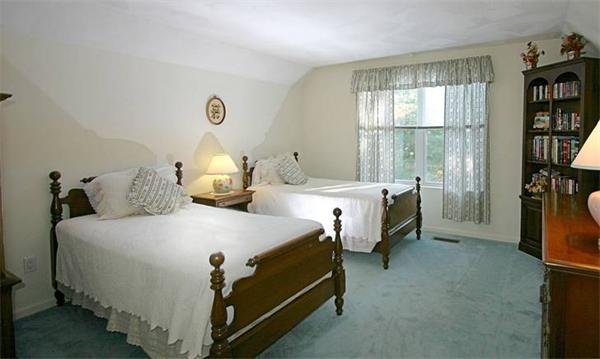 14 Deer Path, Unit 14 Hudson, MA 01749 - Photo 14 of 18 a bedroom with bed and a window