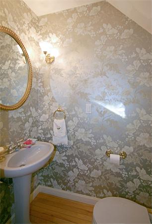 14 Deer Path, Unit 14 Hudson, MA 01749 - Photo 17 of 18 a bathroom with a sink and a mirror