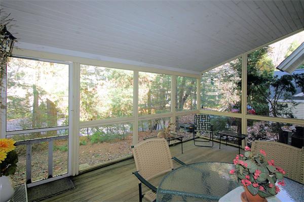 14 Deer Path, Unit 14 Hudson, MA 01749 - Photo 18 of 18 a living room with furniture and a floor to ceiling window