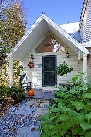 14 Deer Path, Unit 14 Hudson, MA 01749 - Photo 2 of 18 a front view of a house with a yard