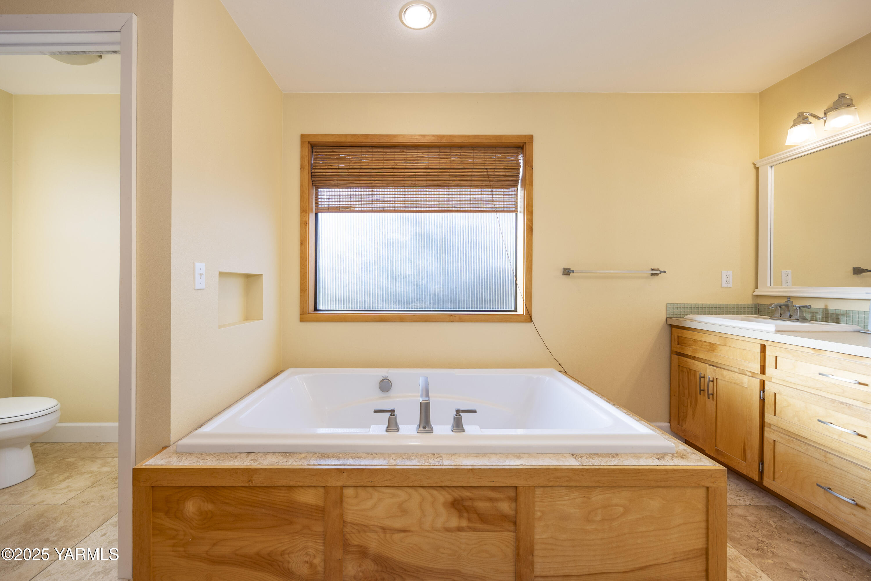 10240 Van Belle Road Sunnyside, WA 98944 - Photo 30 of 52 a bathroom with a sink and a mirror