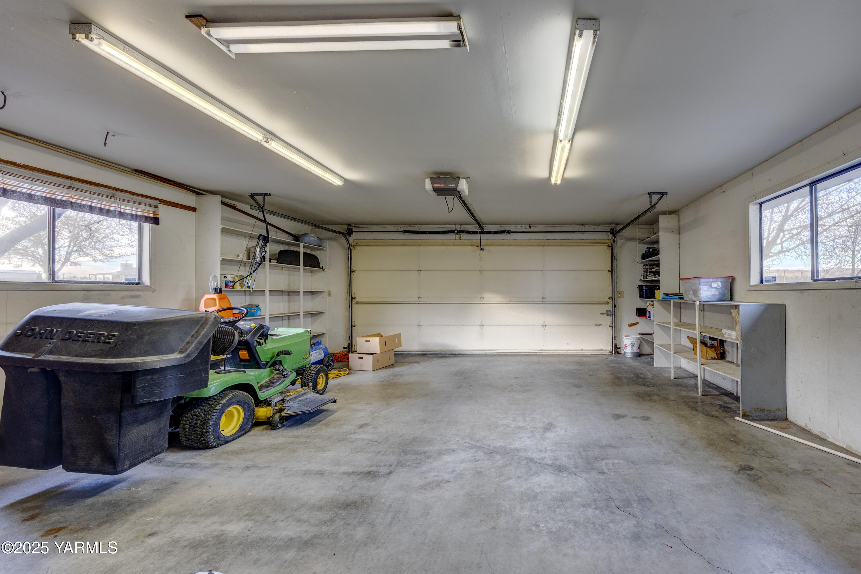 10240 Van Belle Road Sunnyside, WA 98944 - Photo 42 of 52 a view of a garage with a refrigerator