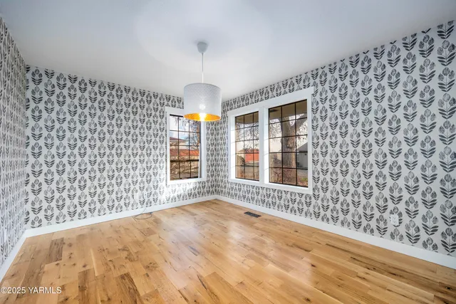 a view of an empty room and window