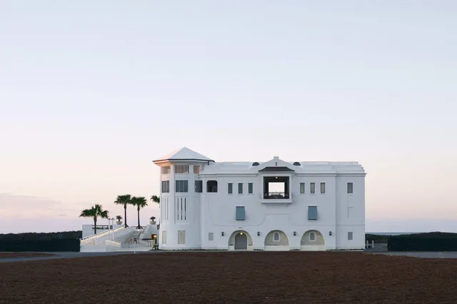a living room with lots of furniture and rug