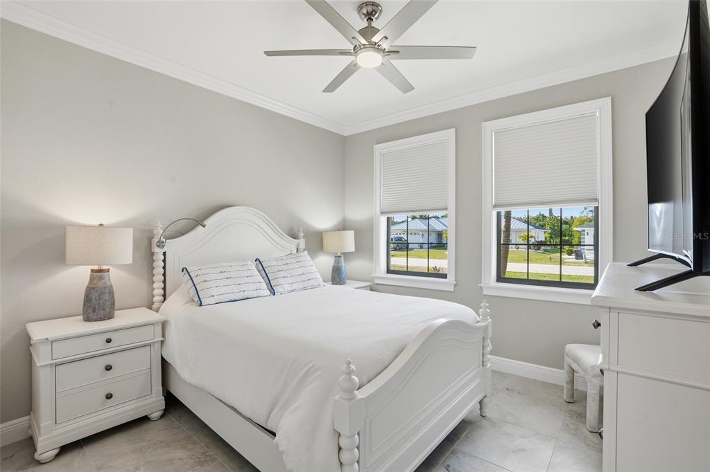 7416 South Seagrape Road Punta Gorda, FL 33955 - Photo 21 of 39 a bedroom with a bed and a window