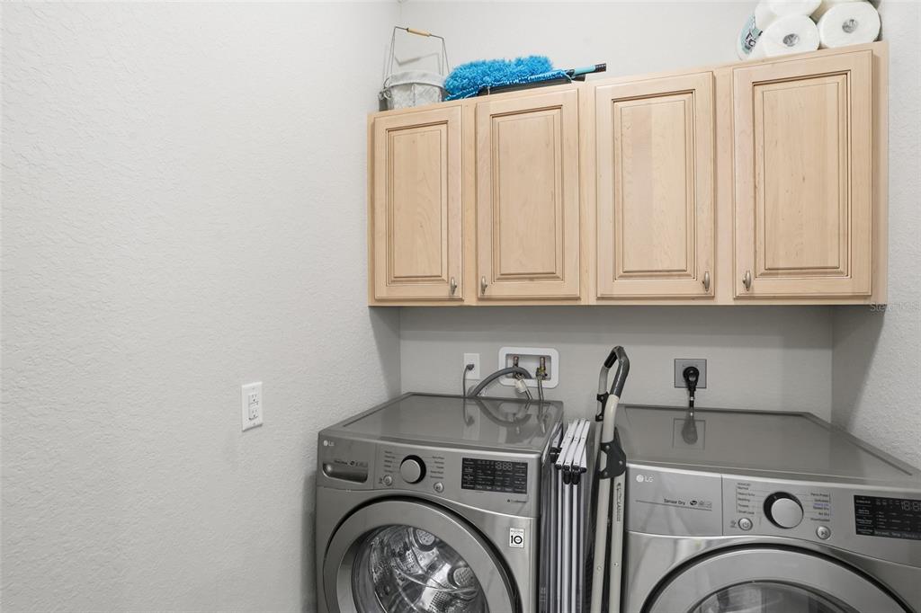 7416 South Seagrape Road Punta Gorda, FL 33955 - Photo 25 of 39 a utility room with dryer and washer