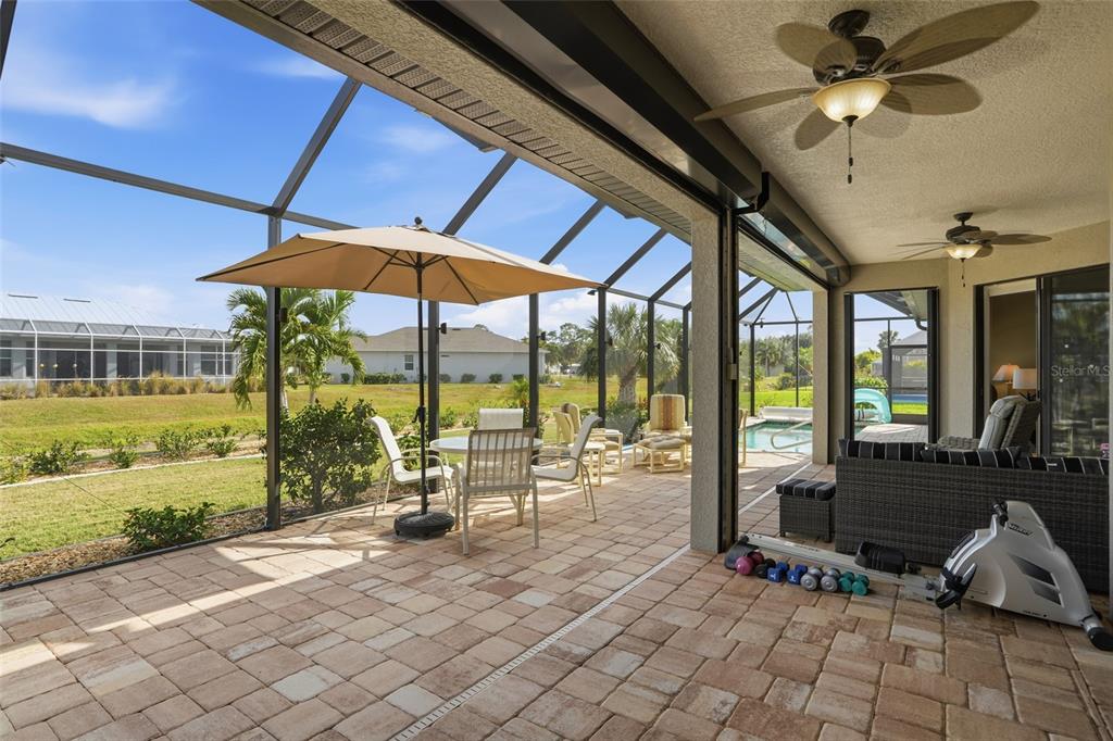 7416 South Seagrape Road Punta Gorda, FL 33955 - Photo 29 of 39 a view of a swimming pool with a patio