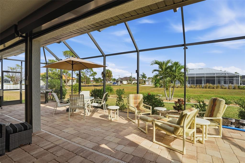 7416 South Seagrape Road Punta Gorda, FL 33955 - Photo 30 of 39 a view of swimming pool with outdoor seating