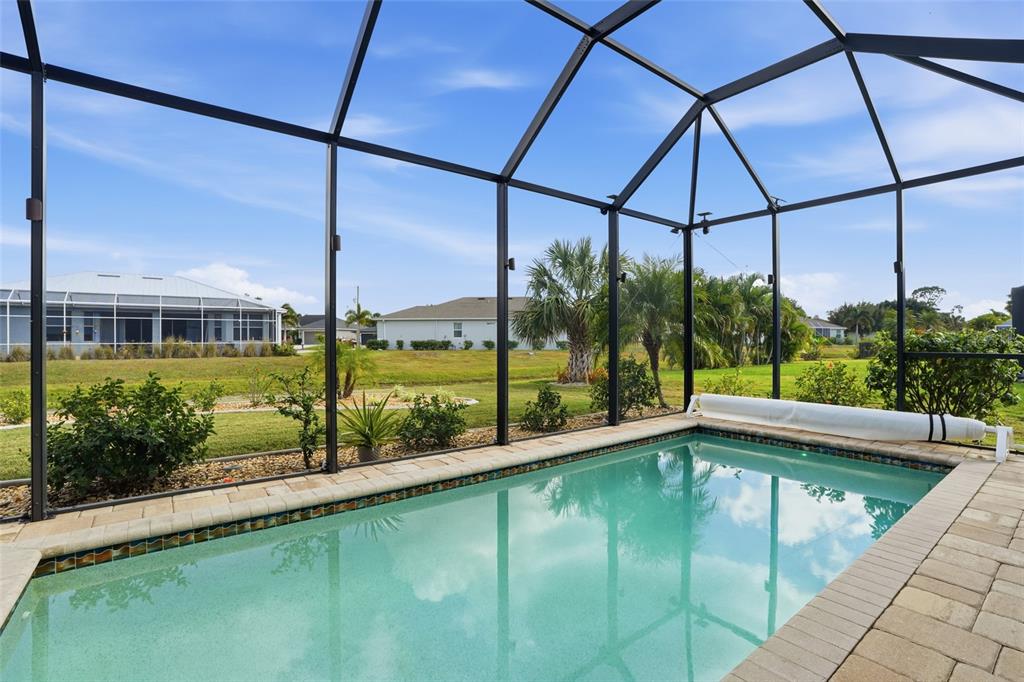 7416 South Seagrape Road Punta Gorda, FL 33955 - Photo 34 of 39 a swimming pool on roof with city view