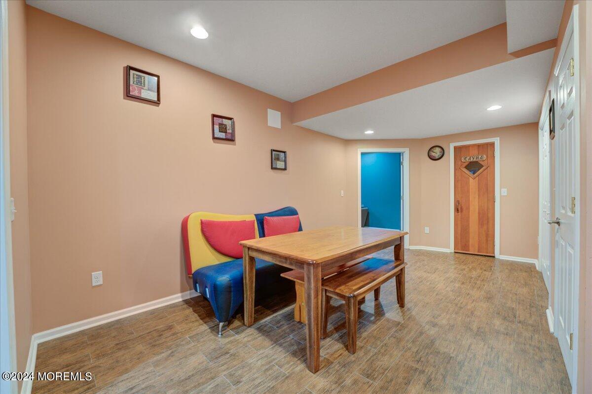 26 Emily Road Manalapan, NJ 07726 - Photo 32 of 49 a room with furniture pool table and wooden floor