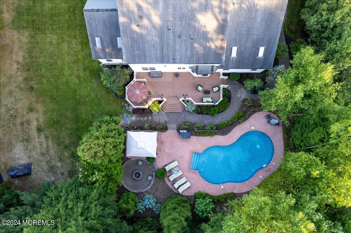 26 Emily Road Manalapan, NJ 07726 - Photo 45 of 49 an aerial view of a house with an outdoor space and street view