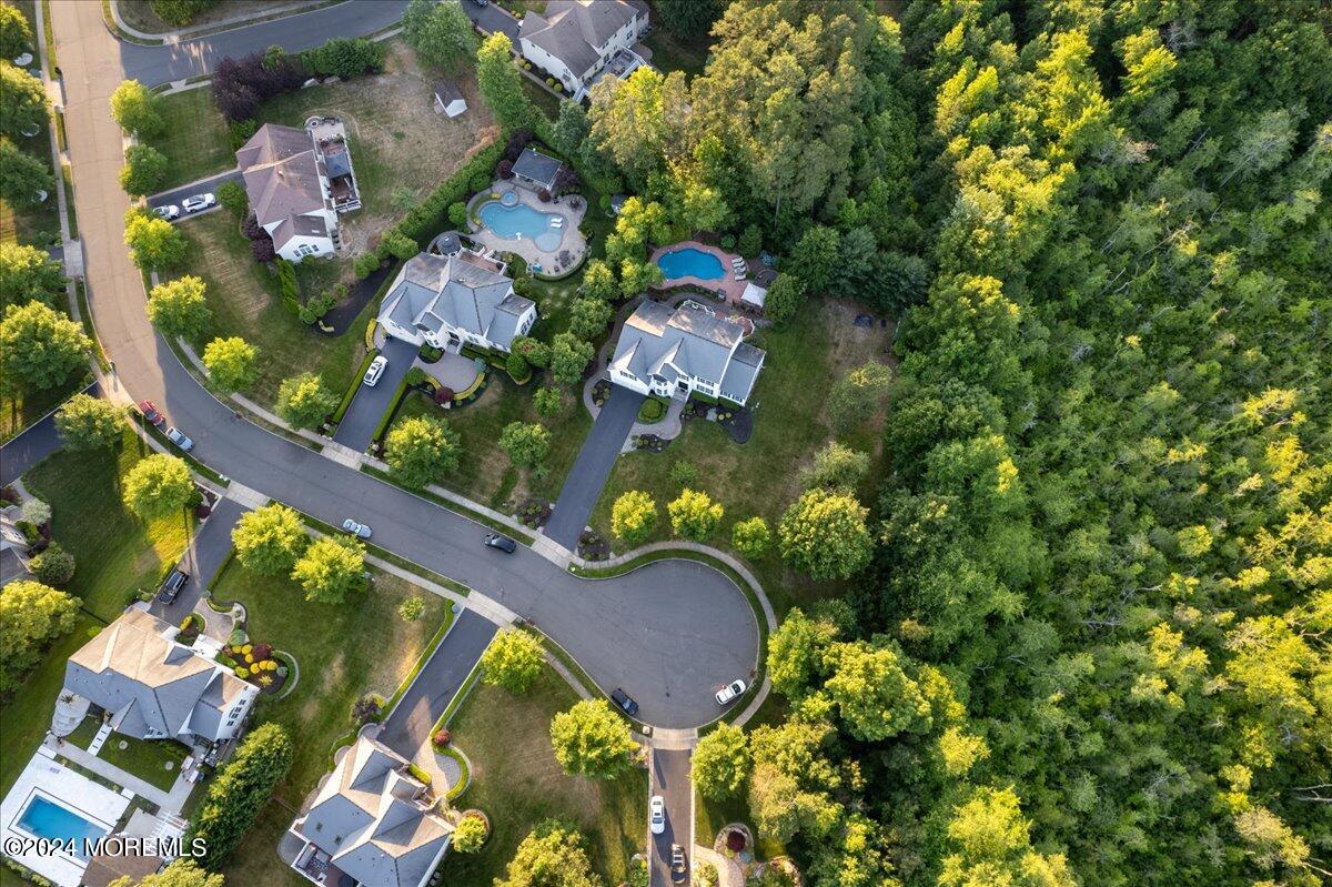 26 Emily Road Manalapan, NJ 07726 - Photo 48 of 49 an aerial view of residential house with outdoor space and swimming pool