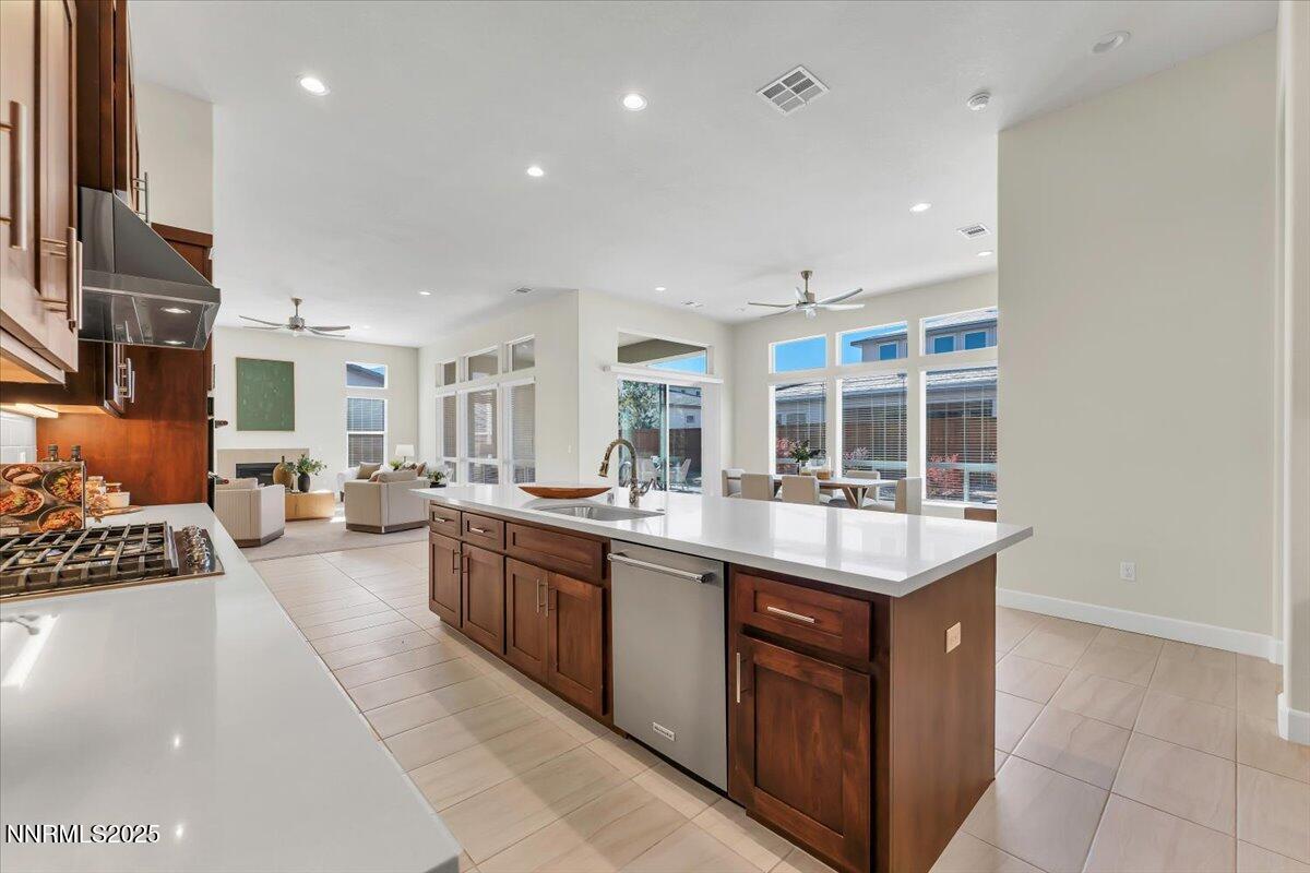 9040 Boomtown Garson Road Verdi, NV 89439 - Photo 16 of 35 a kitchen with sink stove and cabinets
