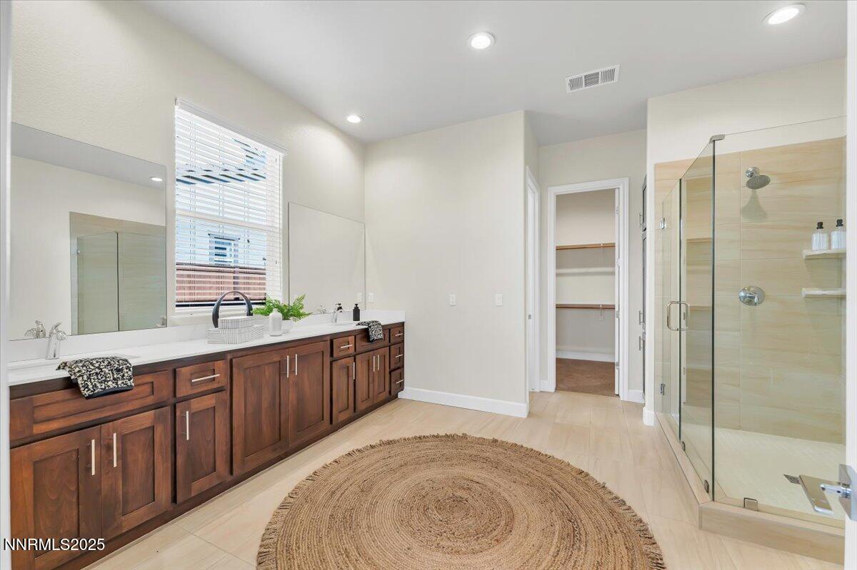 9040 Boomtown Garson Road Verdi, NV 89439 - Photo 20 of 35 a spacious bathroom with a tub sink mirror and shower