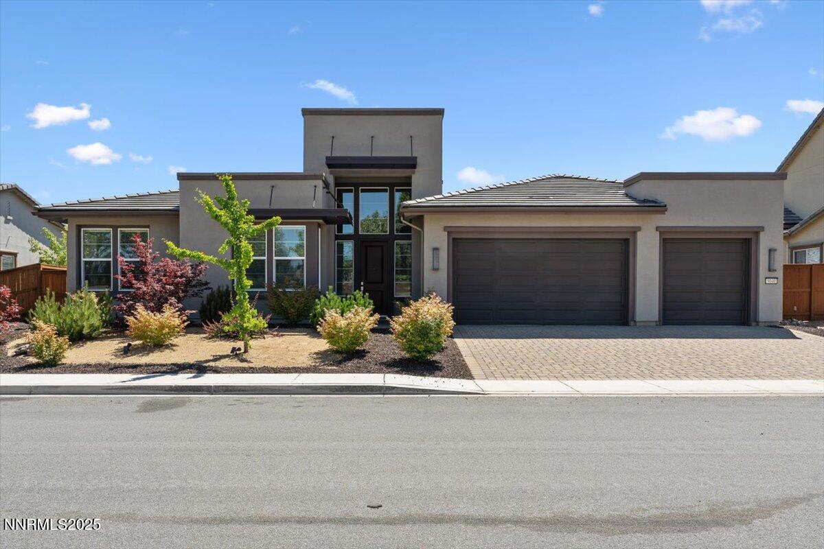 9040 Boomtown Garson Road Verdi, NV 89439 - Photo 2 of 35 a front view of a house with garden