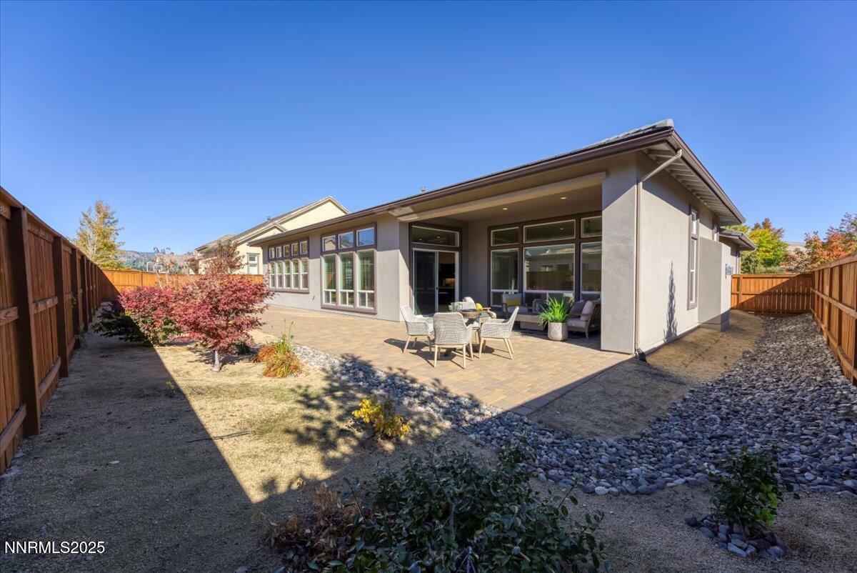 9040 Boomtown Garson Road Verdi, NV 89439 - Photo 31 of 35 a view of a house with backyard and sitting area