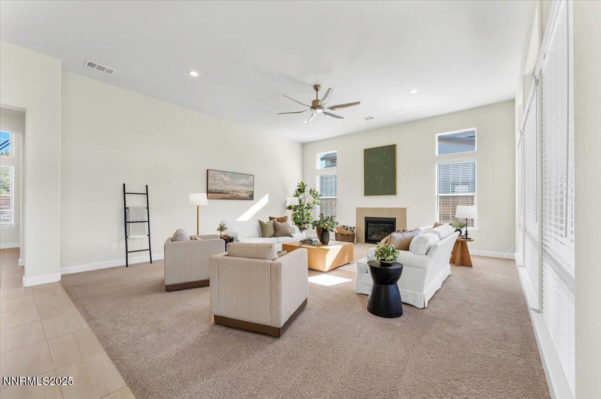 9040 Boomtown Garson Road Verdi, NV 89439 - Photo 8 of 35 a living room with fireplace furniture and a window