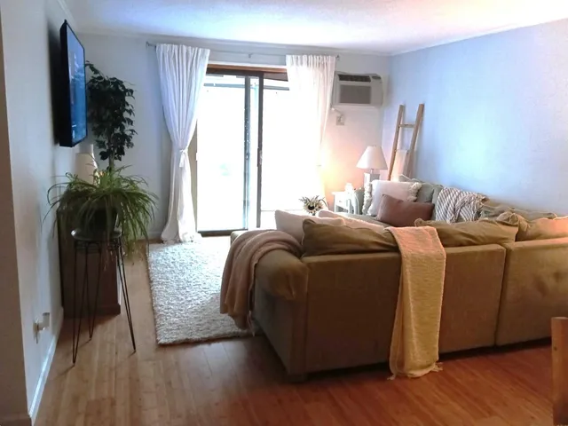 a view of a swimming pool with lounge chairs