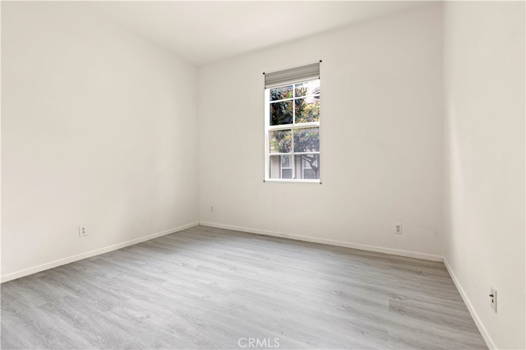 8541 Oak Barrel Place, Unit 2 Rancho Cucamonga, CA 91730 - Photo 13 of 50 an empty room with a window