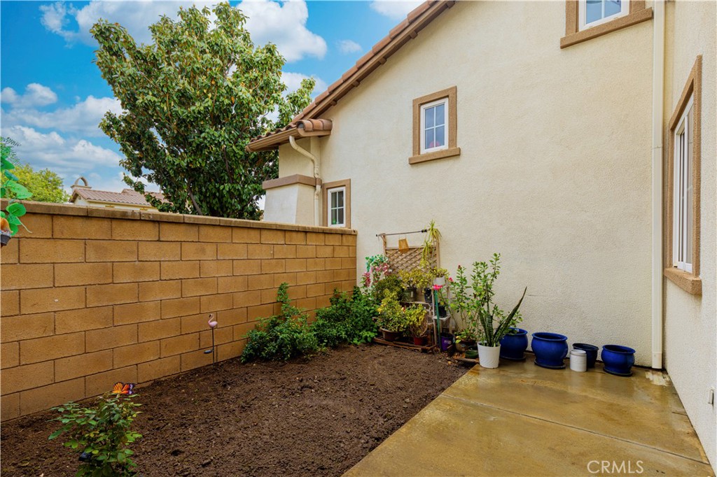 8541 Oak Barrel Place, Unit 2 Rancho Cucamonga, CA 91730 - Photo 22 of 50 a view of a backyard