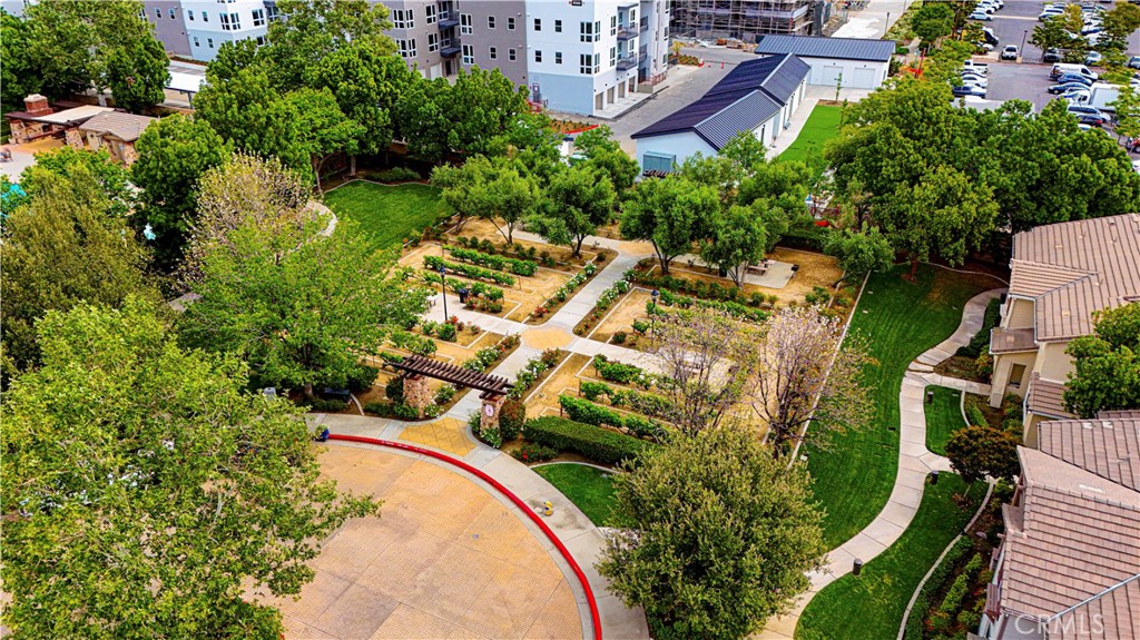 8541 Oak Barrel Place, Unit 2 Rancho Cucamonga, CA 91730 - Photo 46 of 50 an aerial view of a house with a garden and lake view