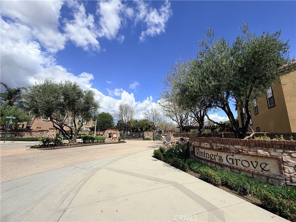 8541 Oak Barrel Place, Unit 2 Rancho Cucamonga, CA 91730 - Photo 48 of 50 a view of a street with houses on both side