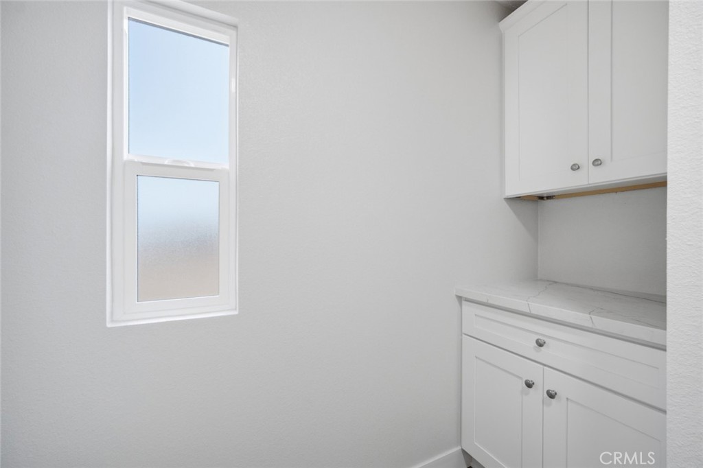 27615 Harrison Avenue Menifee, CA 92585 - Photo 14 of 18 a view of cabinets
