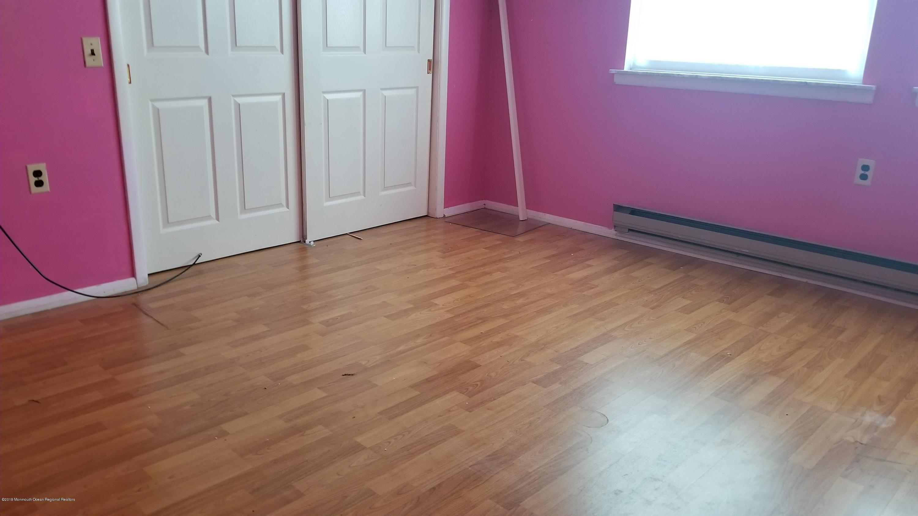 2 Conestoga Drive, Unit A Whiting, NJ 08759 - Photo 11 of 12 a view of a room with wooden floor