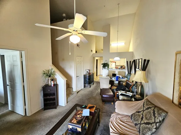 a room with furniture and a chandelier