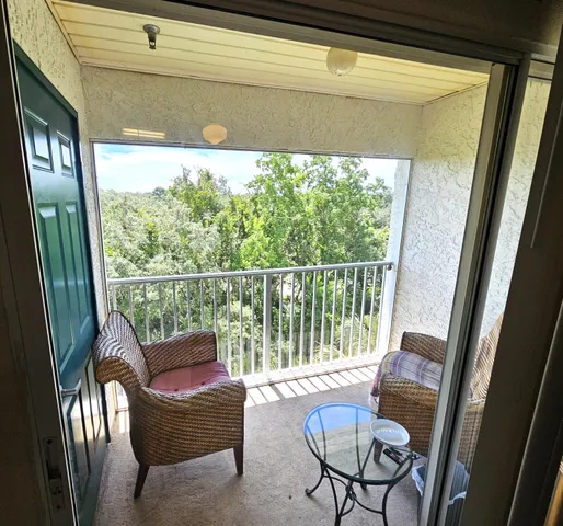 a view of a chairs in balcony